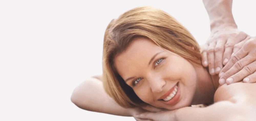 Woman enjoying full body relaxation massage by male massage therapist in Mumbai